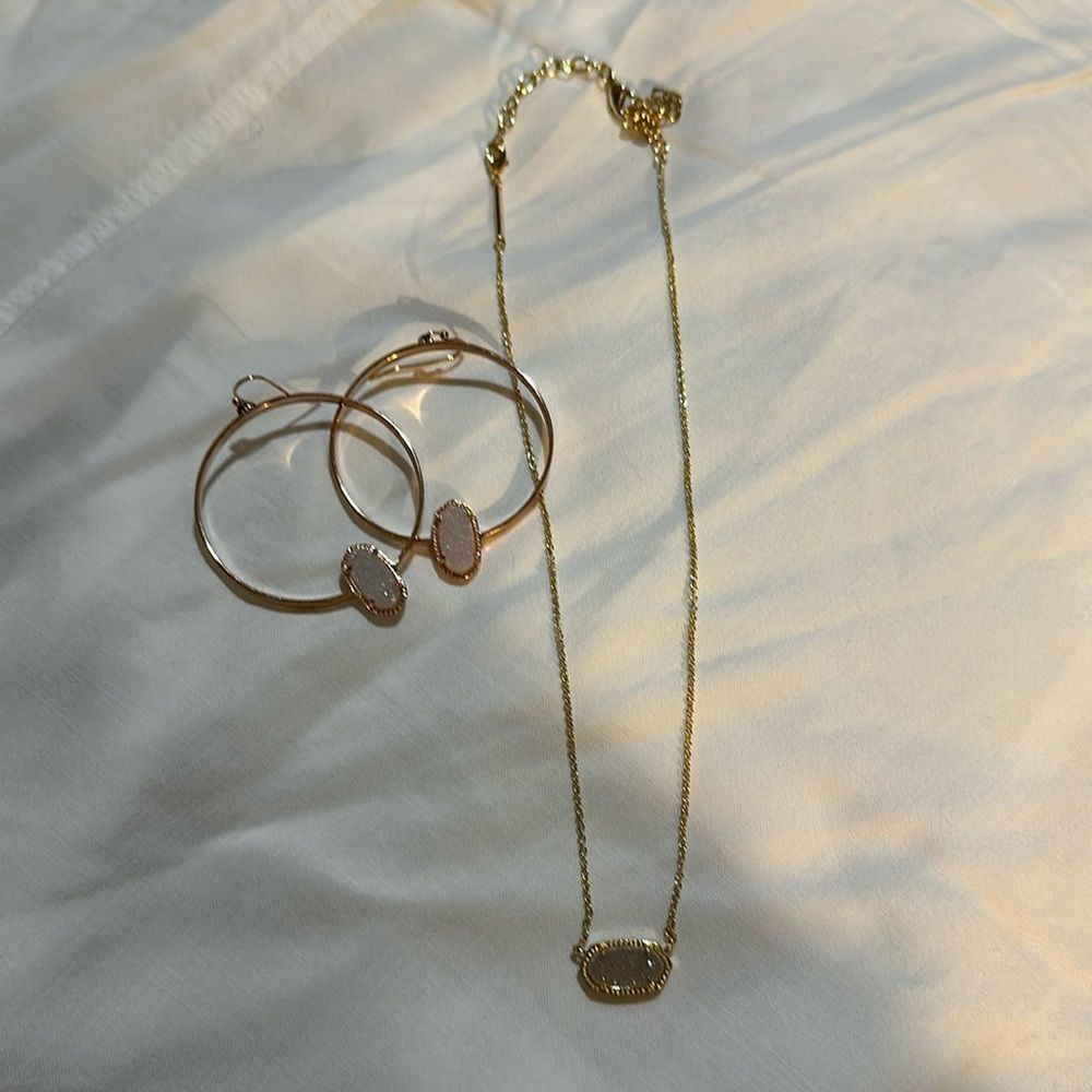 Kendra Scott, gold tone and drusy necklace and earring set.